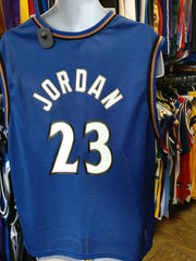 Vintage Champion NBA wizards Michael Jordan 23 Jersey, Men's Fashion, Tops  & Sets, Tshirts & Polo Shirts on Carousell